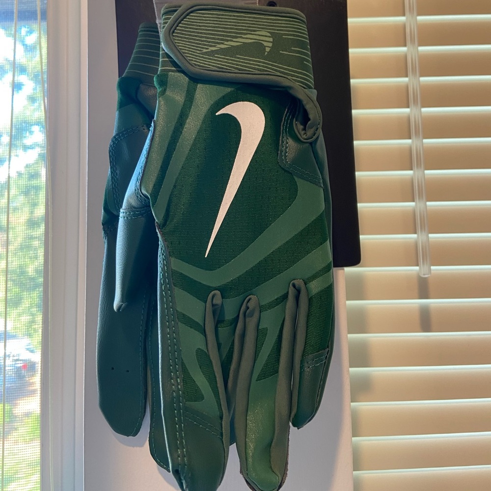Brand new youth large Nike batting gloves